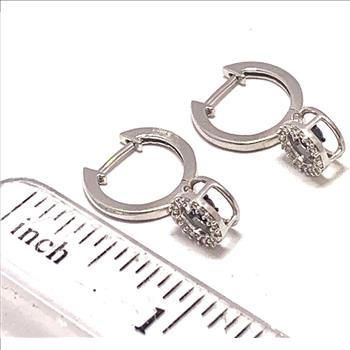 .925 Sterling Silver & 18k White Gold Dancing Diamond Design Earrings.