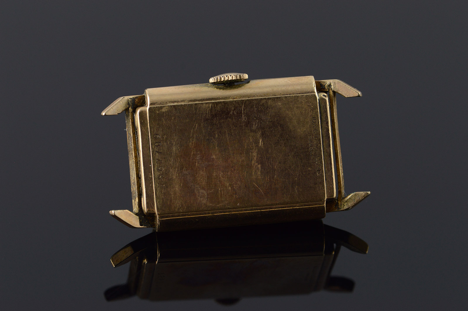 square gold bulova watch