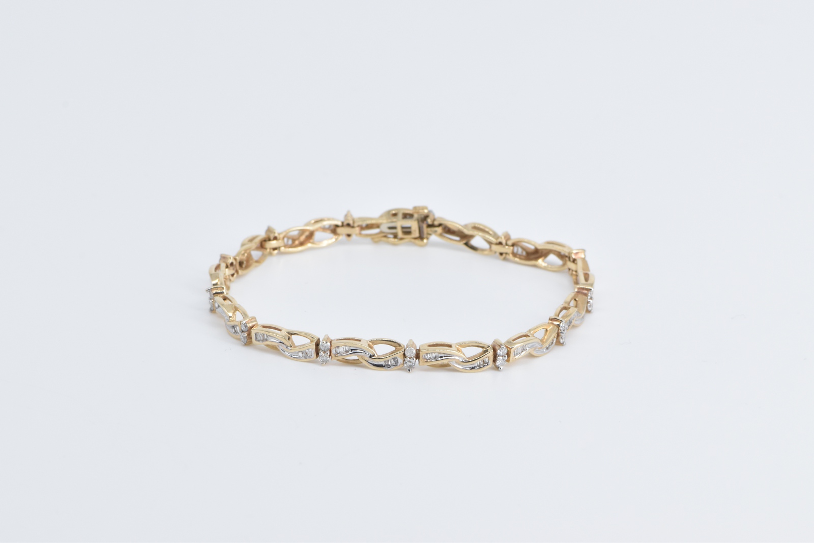 10K 1.50 Ctw Baguette Diamond Wavy Link Tennis Yellow Gold Bracelet 7"