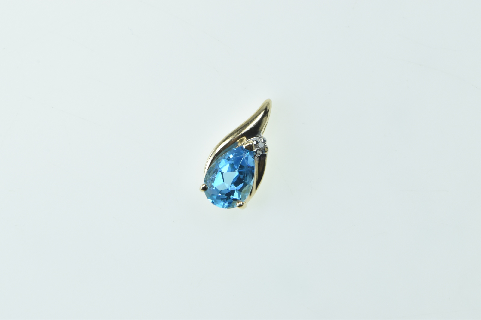 10K Pear Blue Topaz Diamond Accent Fashion Yellow Gold Pendant