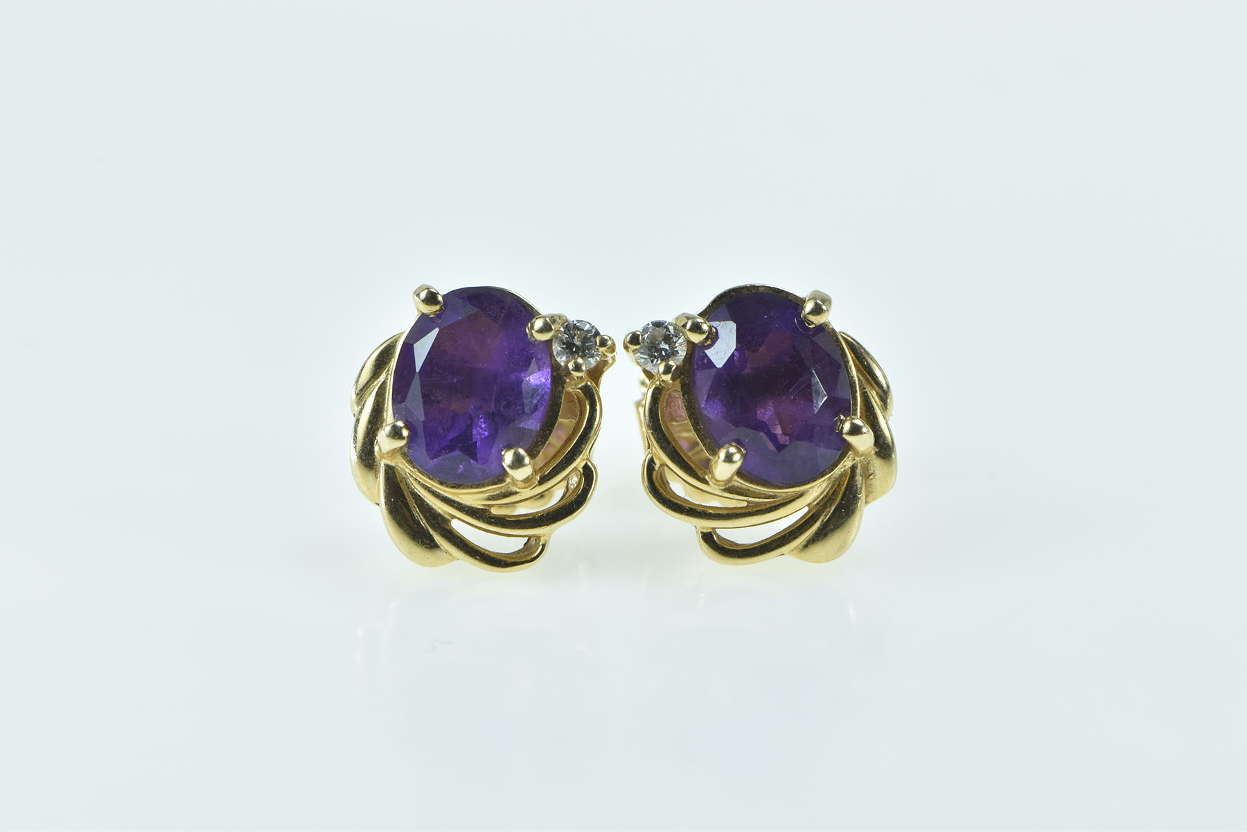 14K Oval Amethyst Diamond Accent Swirl Stud Yellow Gold Earrings