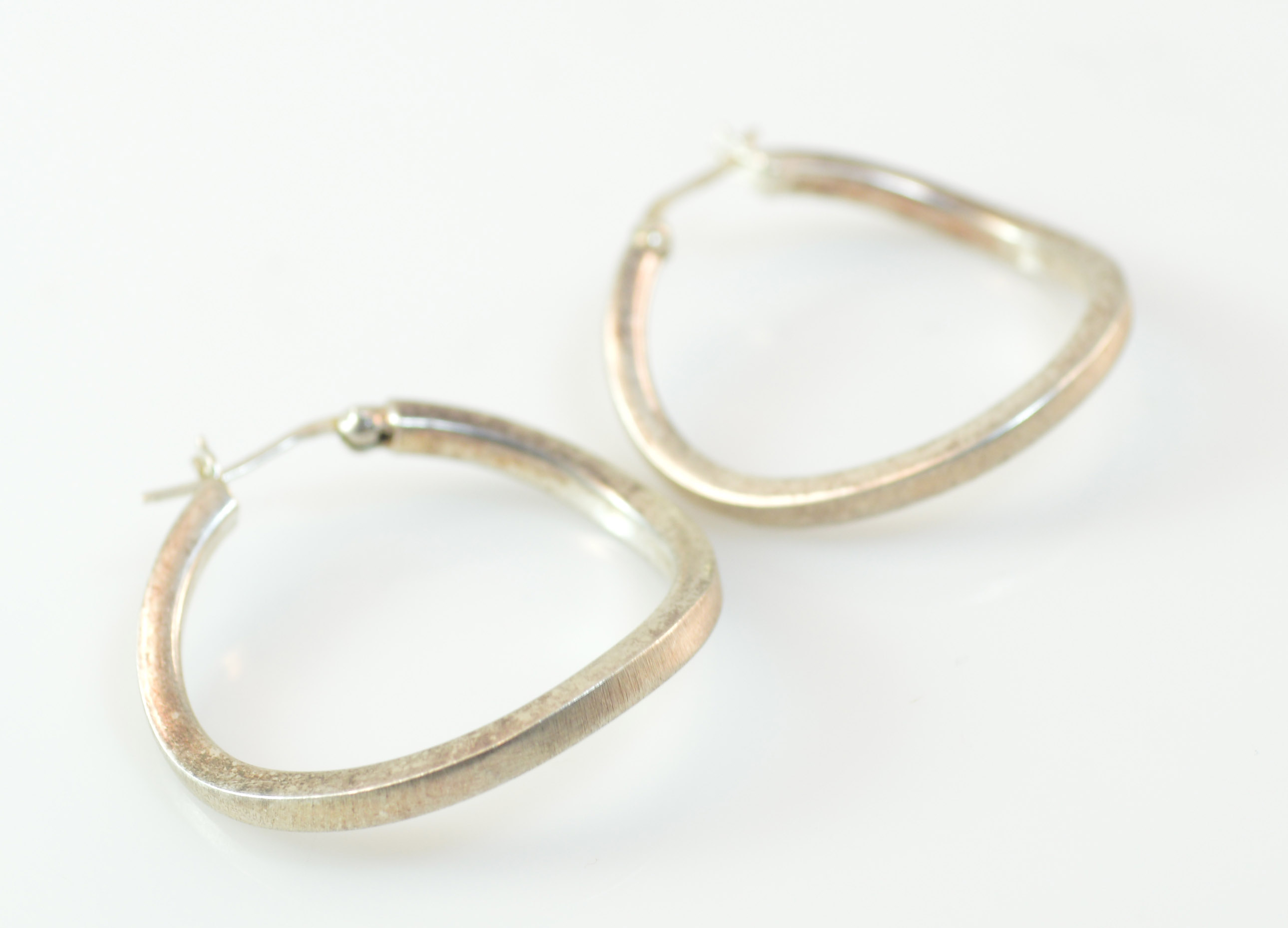 6g Solid Silver Curved Hinged Back Hoop Sterling Earrings Marked 925 6g Solid Silver Curved Hinged Back Hoop Sterling Earrings Marked 925