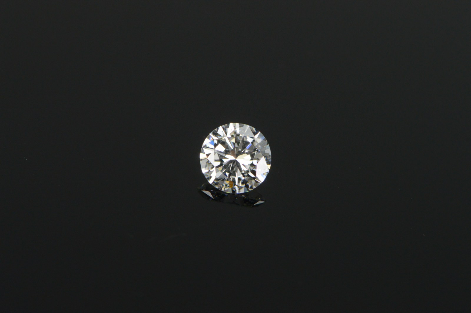 GIA 0.57 Ct Round Brilliant Cut E Color VS2 Clarity Diamond