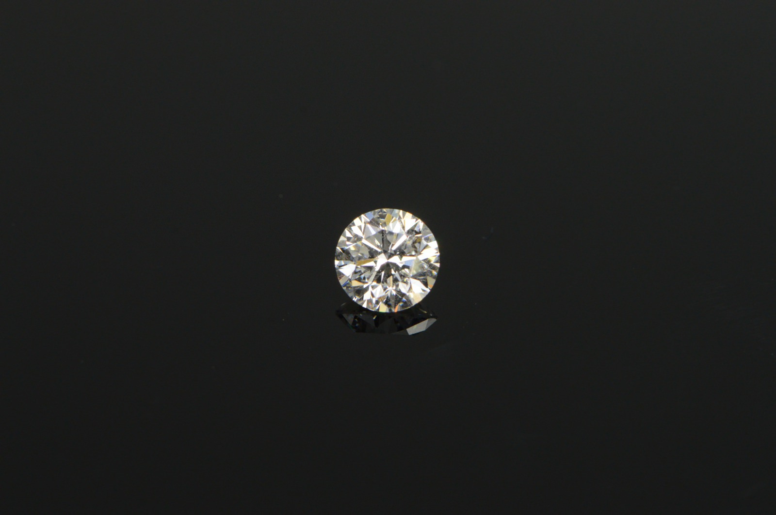 GIA 0.60 Ct Round Brilliant Cut E Color, SI1 Clarity Diamond