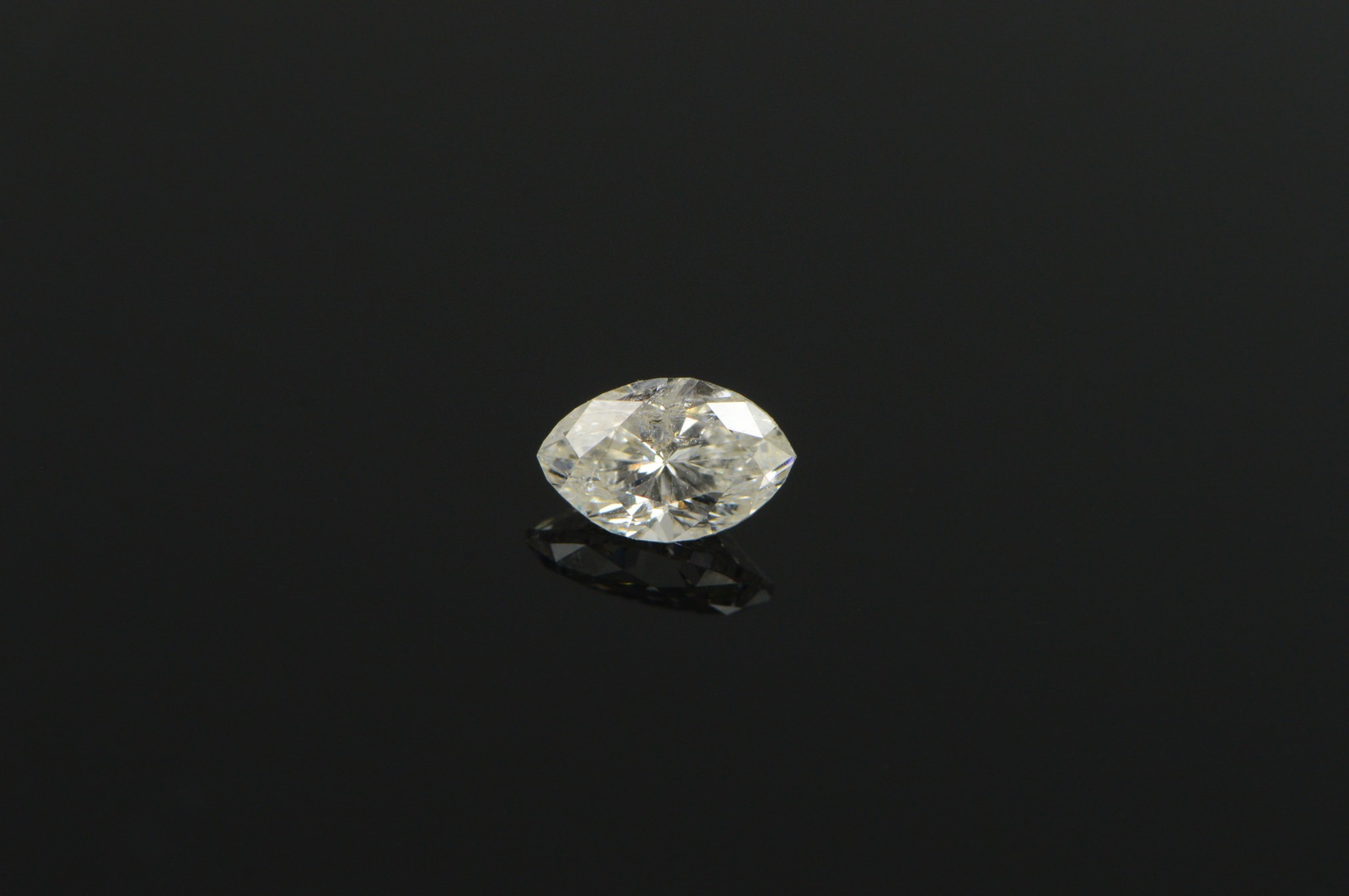 GIA 0.74 Ct Marquise Cut K Color, I3 Clarity Diamond