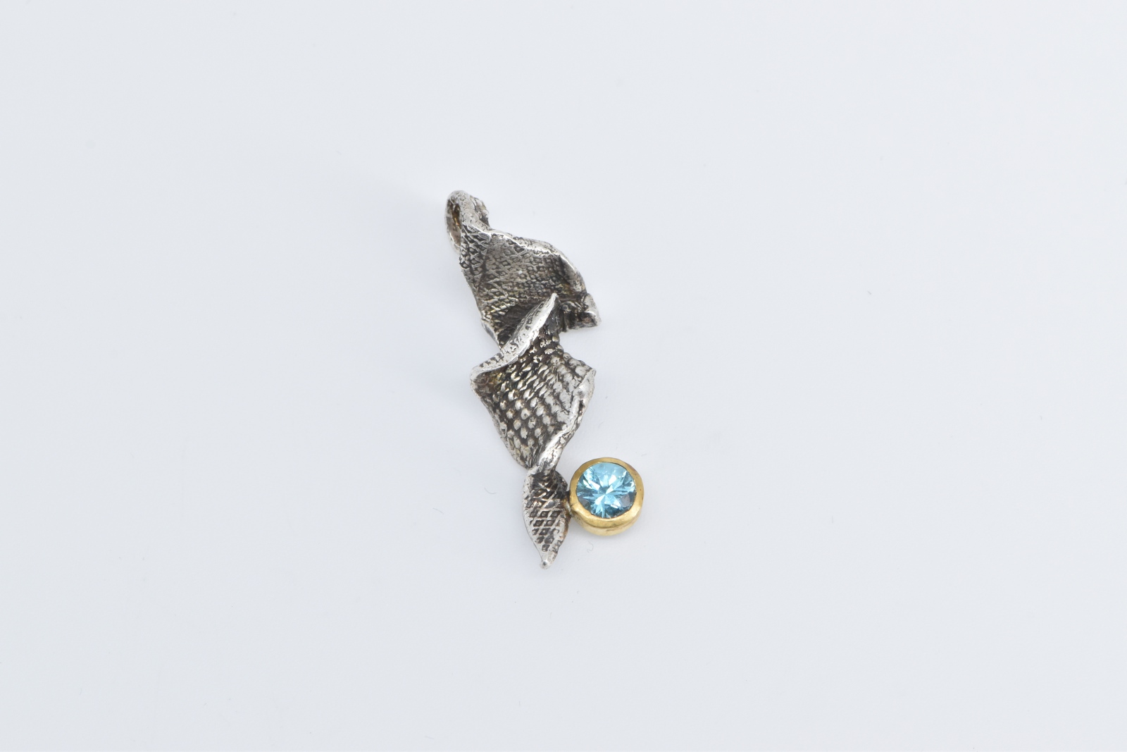 Sterling Silver Two Tone 22k Gold Blue Topaz Abstract Twist Pendant