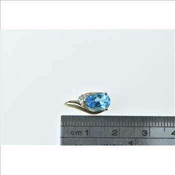 10K Pear Blue Topaz Diamond Accent Fashion Yellow Gold Pendant