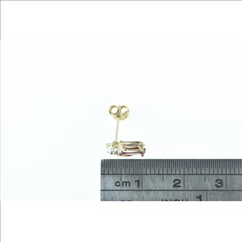 10K Single Oval Syn. Ruby Diamond Accent Stud Yellow Gold Earring