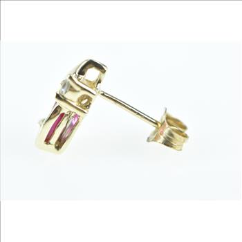 10K Single Oval Syn. Ruby Diamond Accent Stud Yellow Gold Earring