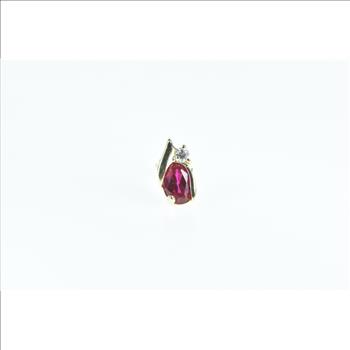 10K Single Oval Syn. Ruby Diamond Accent Stud Yellow Gold Earring