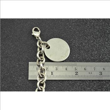 33.2g Solid Silver Tiffany & Co. High Retail Value Round Tag Charm Signature Sterling Bracelet Marked T & Co. 925