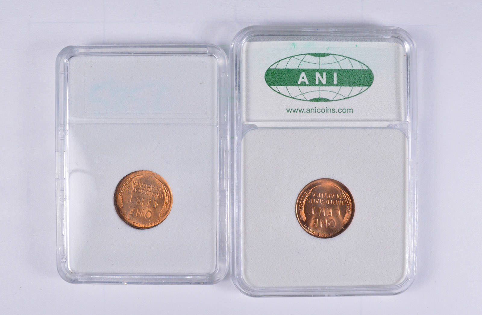 Lot of 2 Different SLABS Graded Coins Property Room