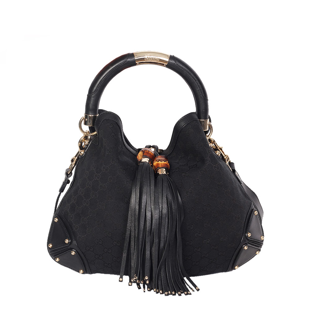 black gucci bag with tassel
