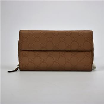 Gucci Monogram Leather Wallet