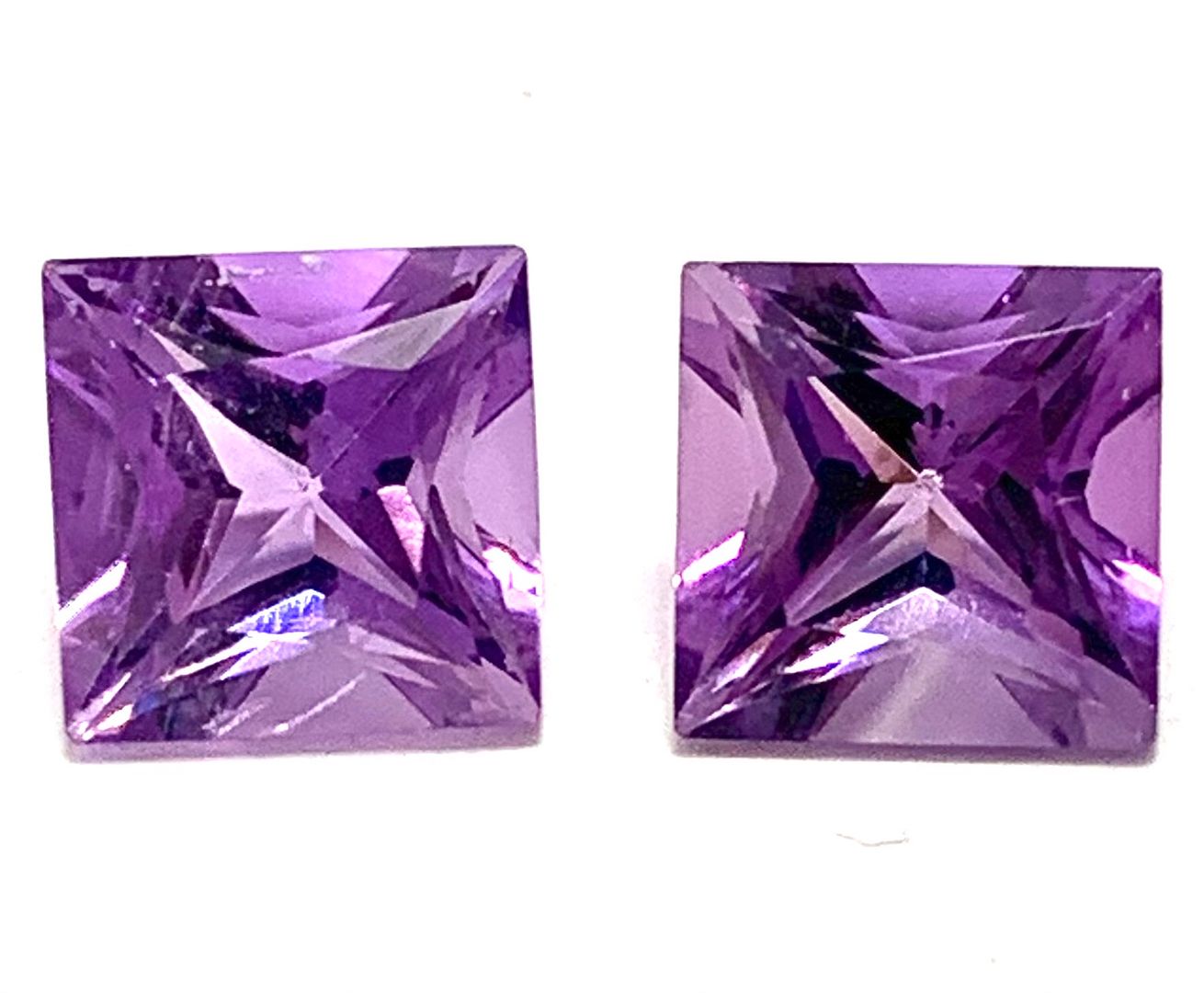 2.55ctw Lot Of 2 Matching Natural Brazilian Amethyst Gemstones