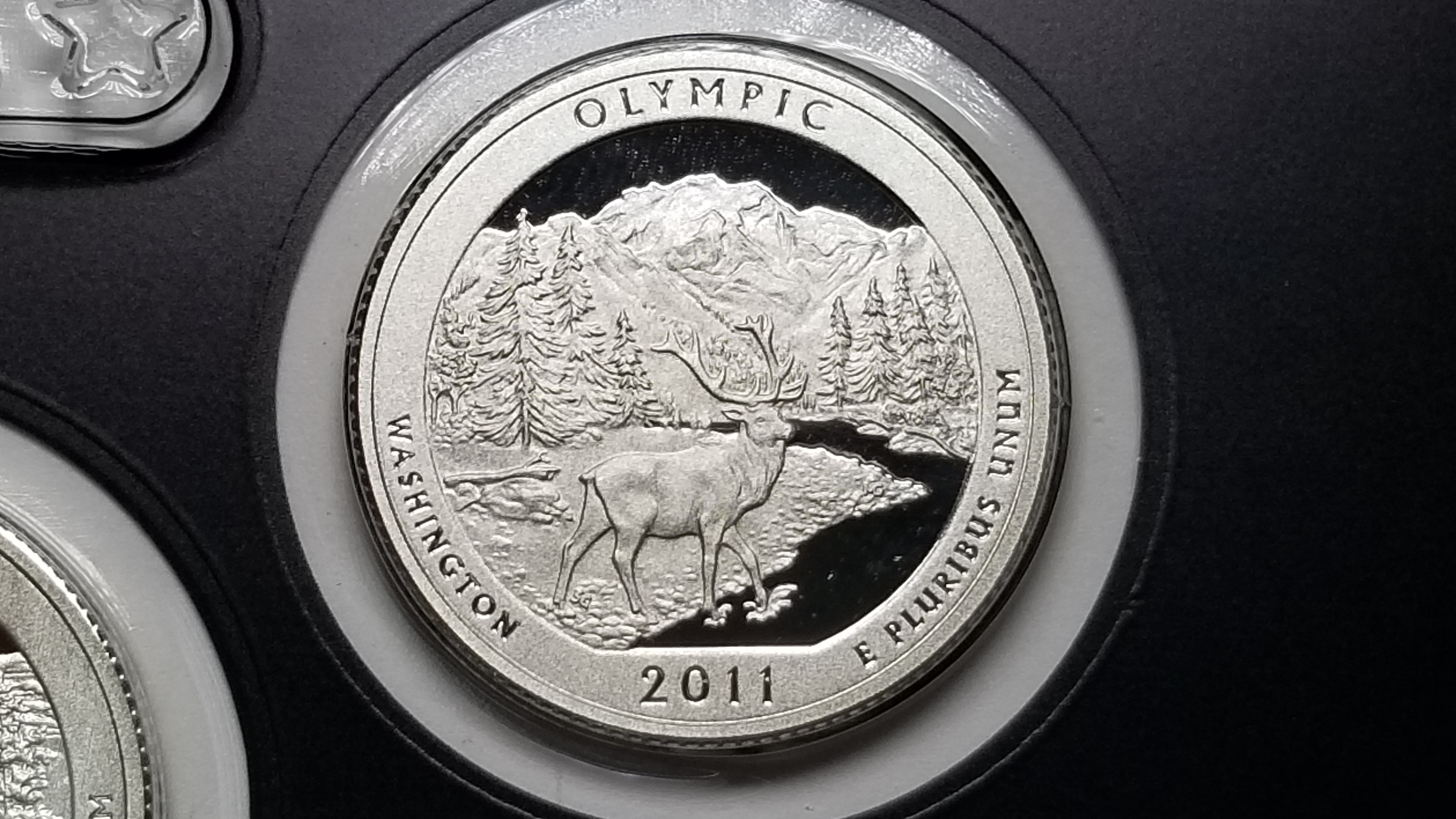 2011 S Silver Olympic Quarter Gem Proof Cameo | Property Room