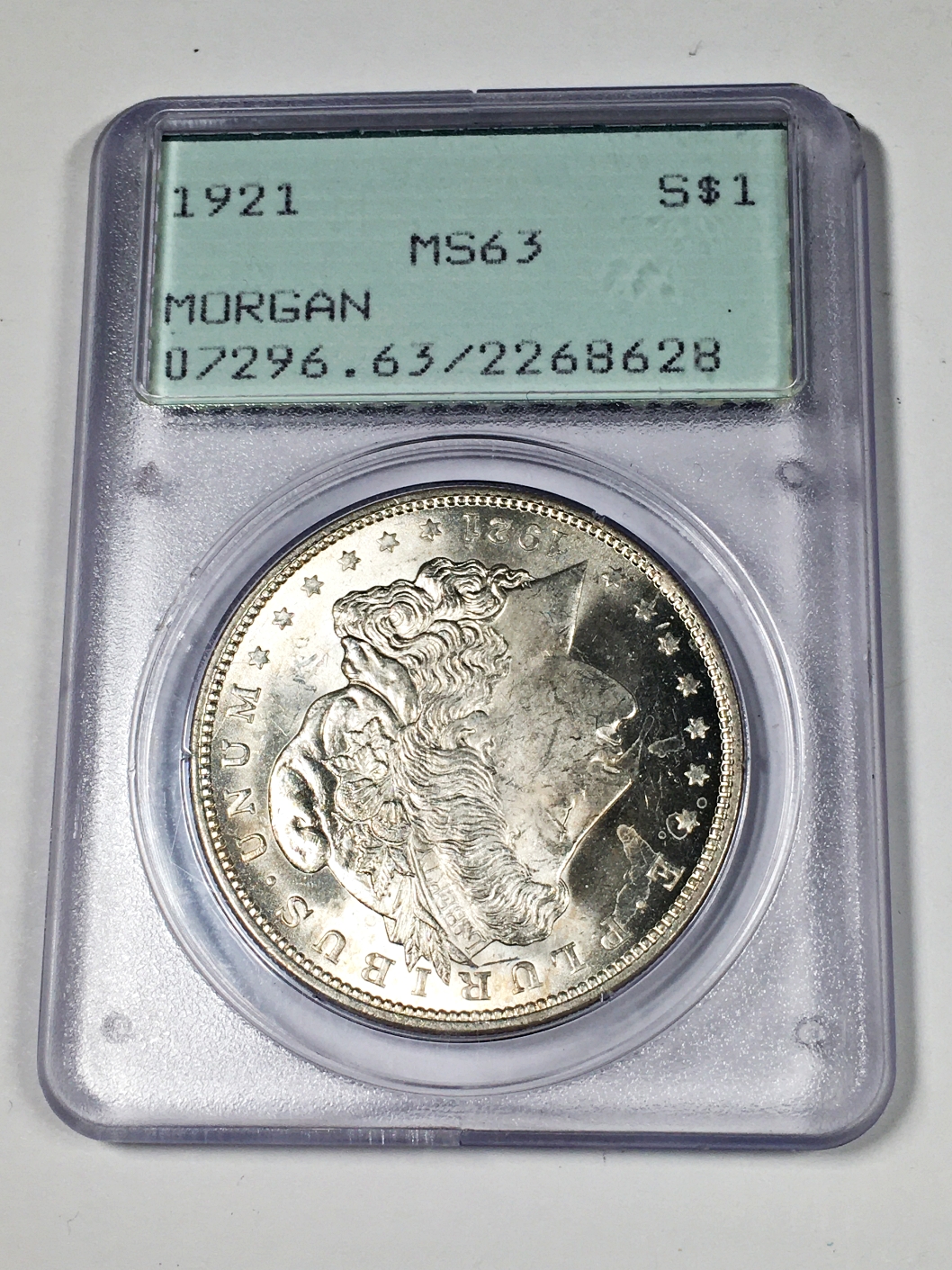 1921 morgan silver dollar graded ms63 by pcgs rattler holder property