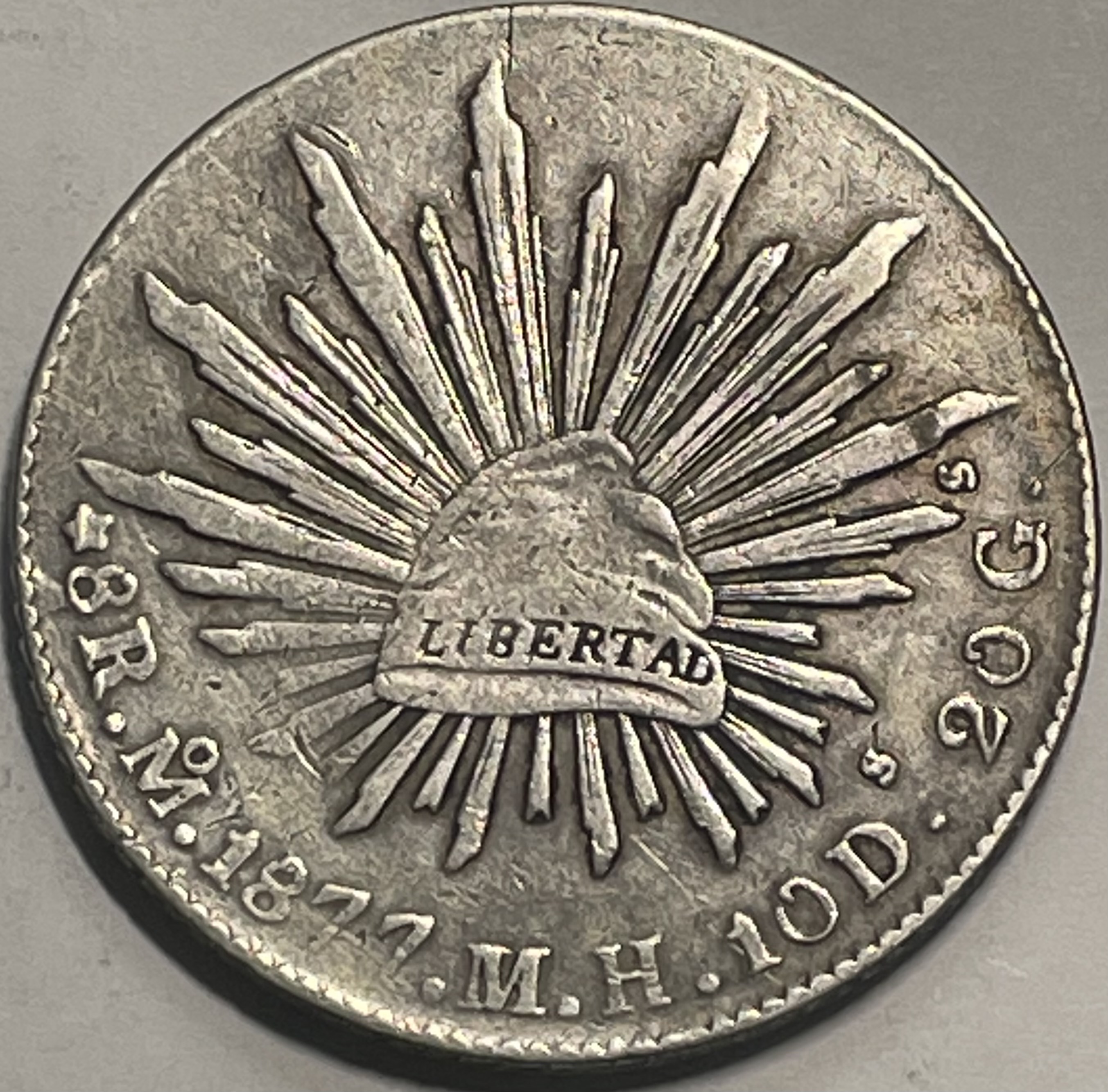 1877-mexico-silver-8-reales-property-room