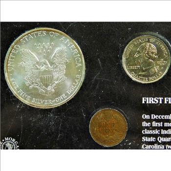 First Flight Coin Collection - 100 Years of Flight - Wright Brothers - w/2003 Colorized 1 oz American Silver Eagle - 1903 Indian Head Cent - 2001 North Carolina Quarter - 2002 Ohio State Quarter