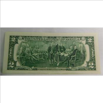Crisp Uncirculated Series 1995 $2 Millennium Note - Federal Reserve Bank of St. Louis -- This is a Unique Series That Begins with the Serial Number of 2000 - Protected in Plastic Sleeve within a an Informational Card