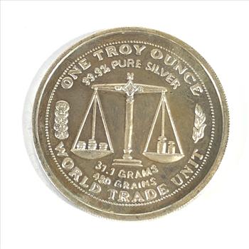 One Troy Ounce .999 Fine Silver Round*1986 World Trade Unit