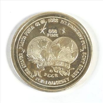 One Troy Ounce .999 Fine Silver Round*1986 World Trade Unit