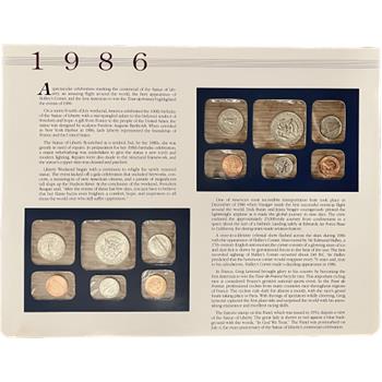 * 1986 (P&D) U.S. Uncirculated Mint Sets & Statue of Liberty 8 Cent Stamp on Large Year of 1986 Historical Collector Panel