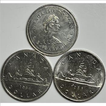 . 1984 Voyageur & Jacques Cartier  & 1986 Voyageur Canada One Dollar Coins - 3 Brilliant Uncirculated Coins