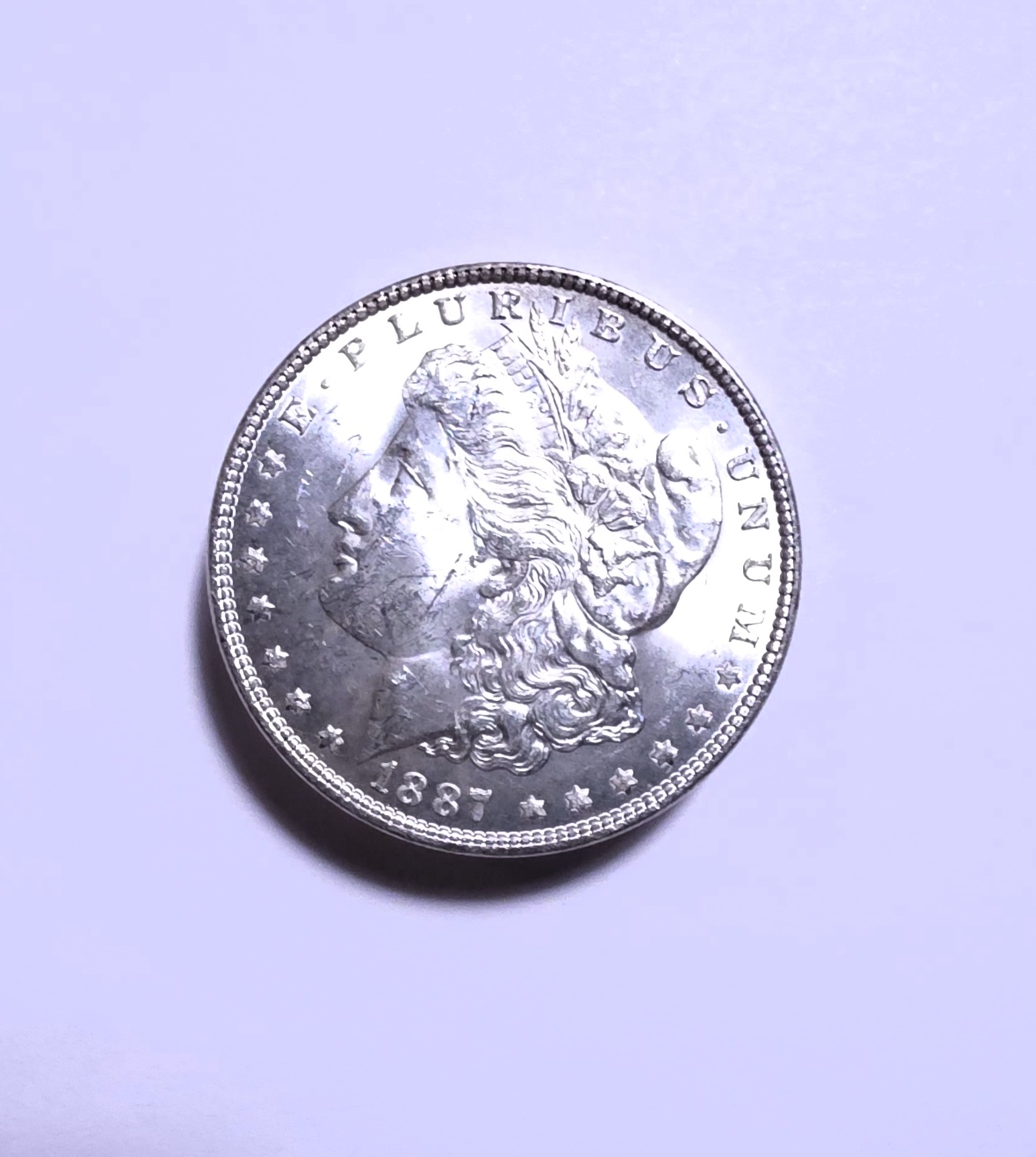 1887-P Morgan Silver Dollar - Select Brilliant Uncirculated - Die Breaks on Reverse -  443