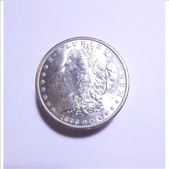 1899-O Morgan Silver Dollar - Select Brilliant Uncirculated - Die Breaks on Reverse - 102