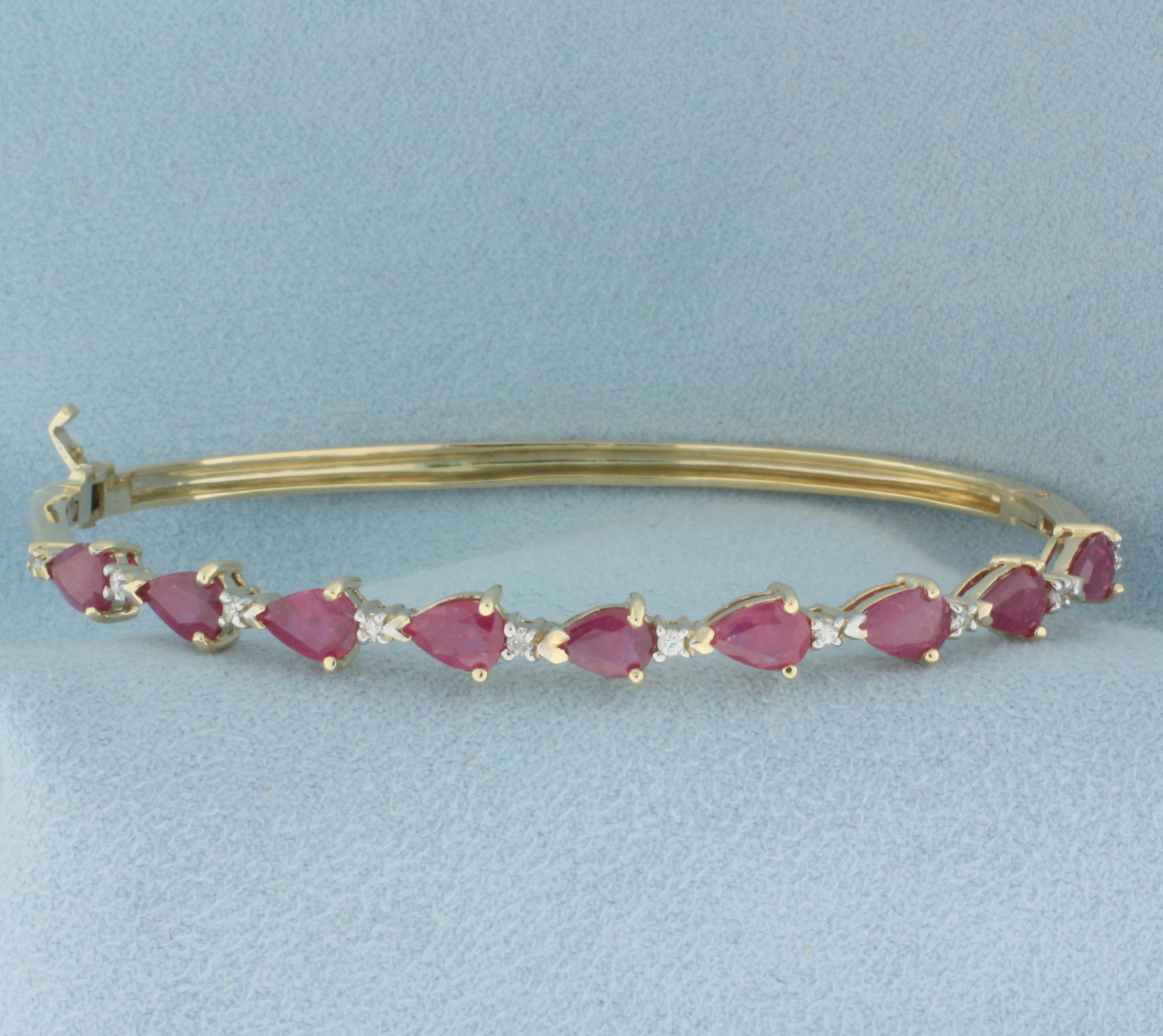 Ruby and Diamond Hinged Bangle Bracelet in 14k Yellow Gold