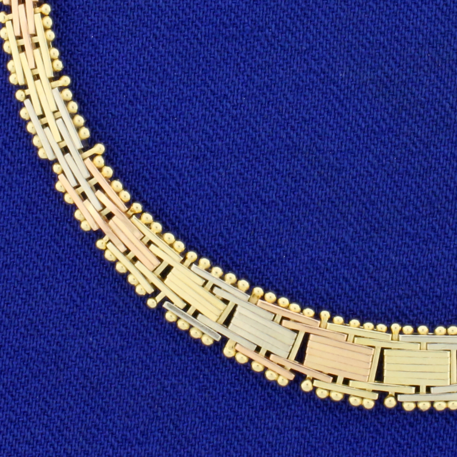 Italian Made Tri Color Basket Weave Graduated Bracelet in 14K Yellow