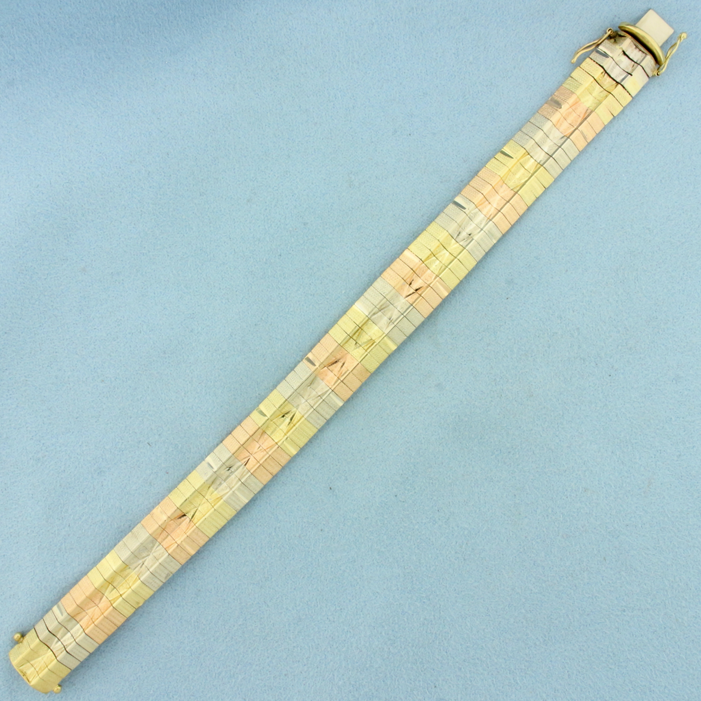 Tri Color Diamond Cut Omega Bracelet in 14k Yellow, Rose, and White Gold
