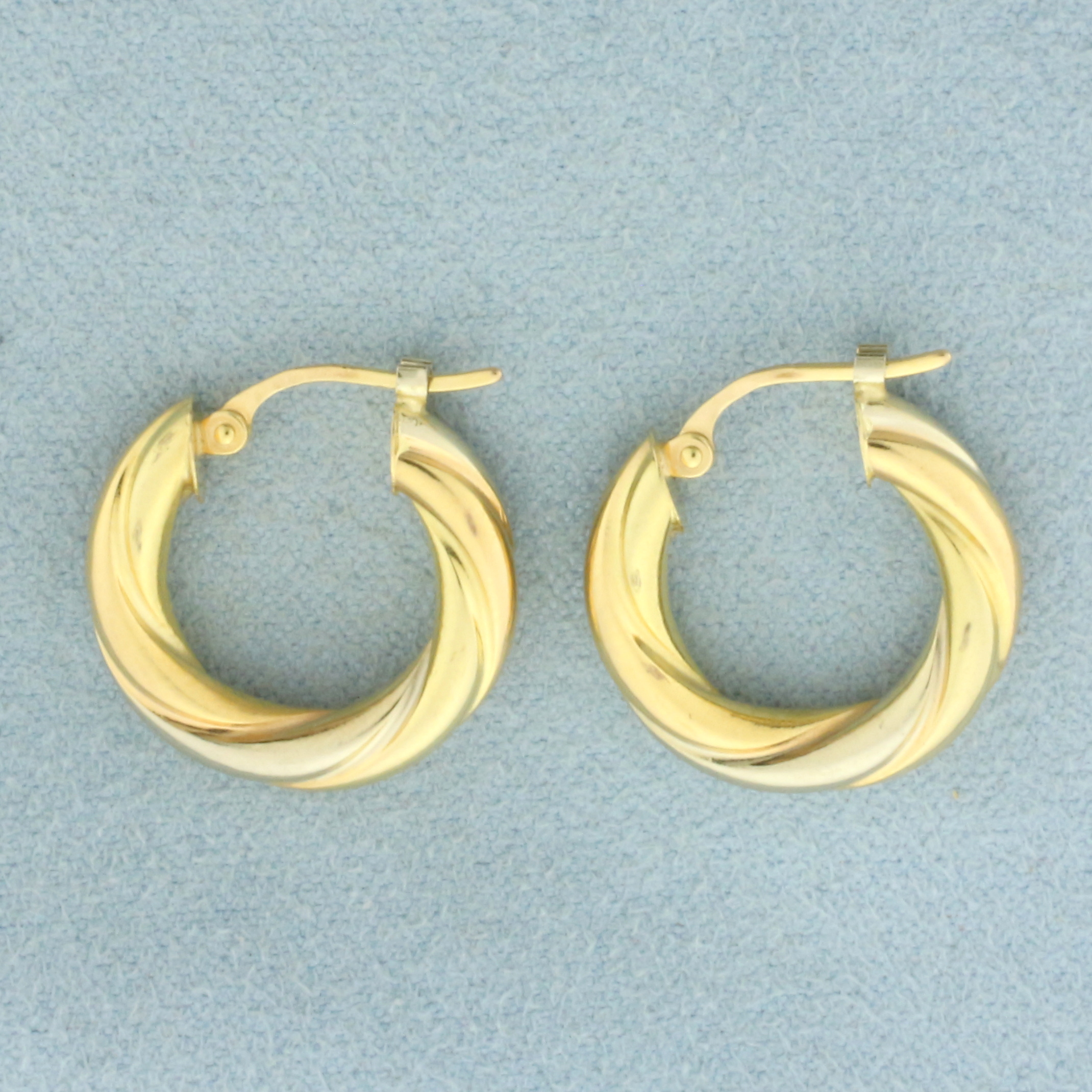 Two Tone Twisting Hoop Earrings in 18k Yellow and White Gold