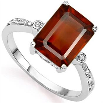 4CT Garnet and Diamond Ring in Sterling Silver