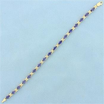 AAA Tanzanite Flower Design Line Bracelet in 14K Yellow Gold