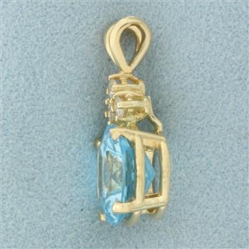 Blue Topaz and Diamond Pendant in 14k Yellow Gold