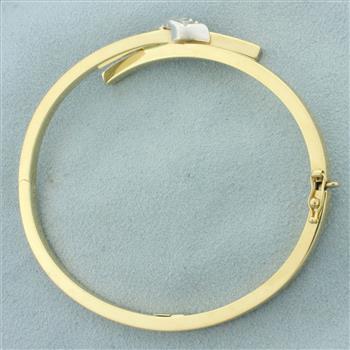 Criss Cross Hinged Bangle Bracelet in 14k Yellow Gold