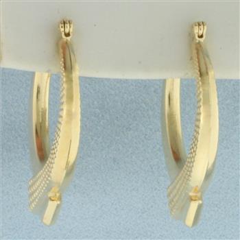 Crossover Ribbon Design Hoop Earrings in 14k Yellow Gold