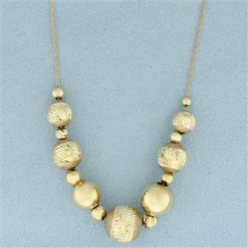 thumbnail image 2 of 14K Yellow Gold Diamond-Cut Ball Bead Chain Necklace - 1mm, 16-24 Inch Lengths 2 of 10