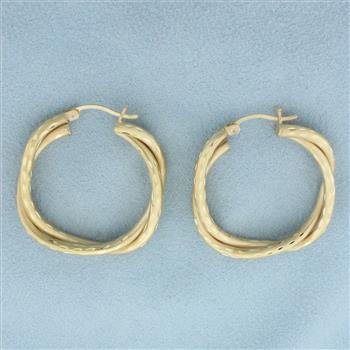 Diamond Cut Satin Finish Twisting Hoop Earrings in 14k Yellow Gold