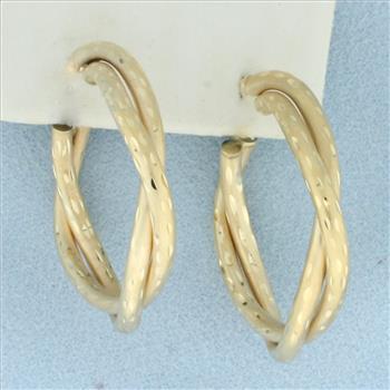 Diamond Cut Satin Finish Twisting Hoop Earrings in 14k Yellow Gold
