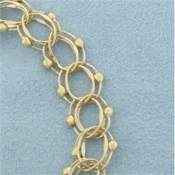 Double Loop Charm Bracelet in 14k Yellow Gold