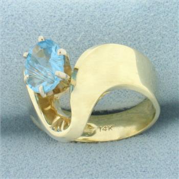 Fancy Oval Cut Swiss Blue Topaz Ring in 14k Yellow Gold