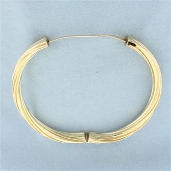 Hinged Twisting Design Bangle Bracelet in 14k Yellow Gold