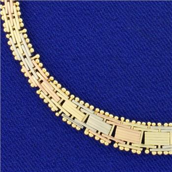 Italian Made Tri Color Basket Weave Graduated Bracelet in 14K Yellow, White, and Rose Gold