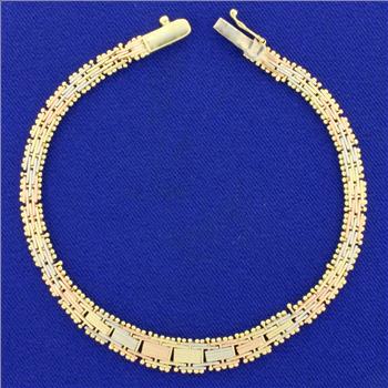 Italian Made Tri Color Basket Weave Graduated Bracelet in 14K Yellow, White, and Rose Gold