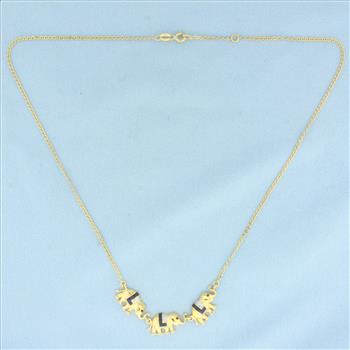 Italian Sapphire, Ruby, and Diamond Elephant Necklace in 18k Yellow Gold