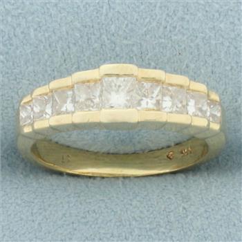 Princess Cut Graduated Cathedral Diamond Ring in 14k Yellow Gold