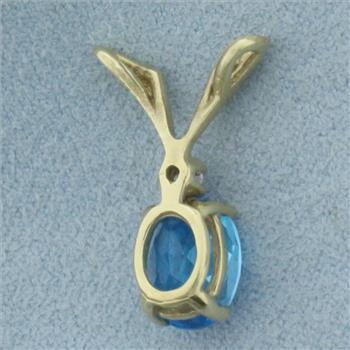 Swiss Blue Topaz and Diamond Pendant in 14k Yellow Gold